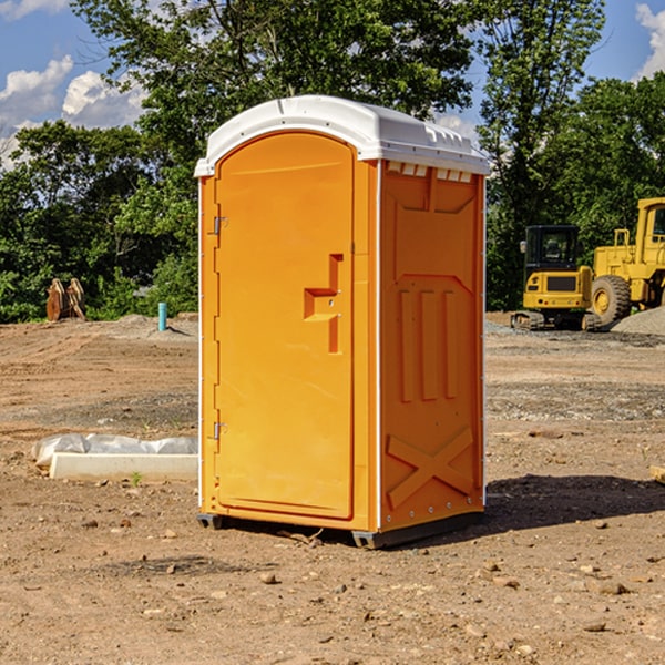 how often are the porta potties cleaned and serviced during a rental period in Westland